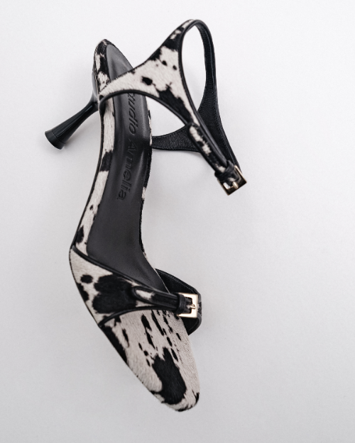 A dalmatian print high-heeled sandal with gold buckle
