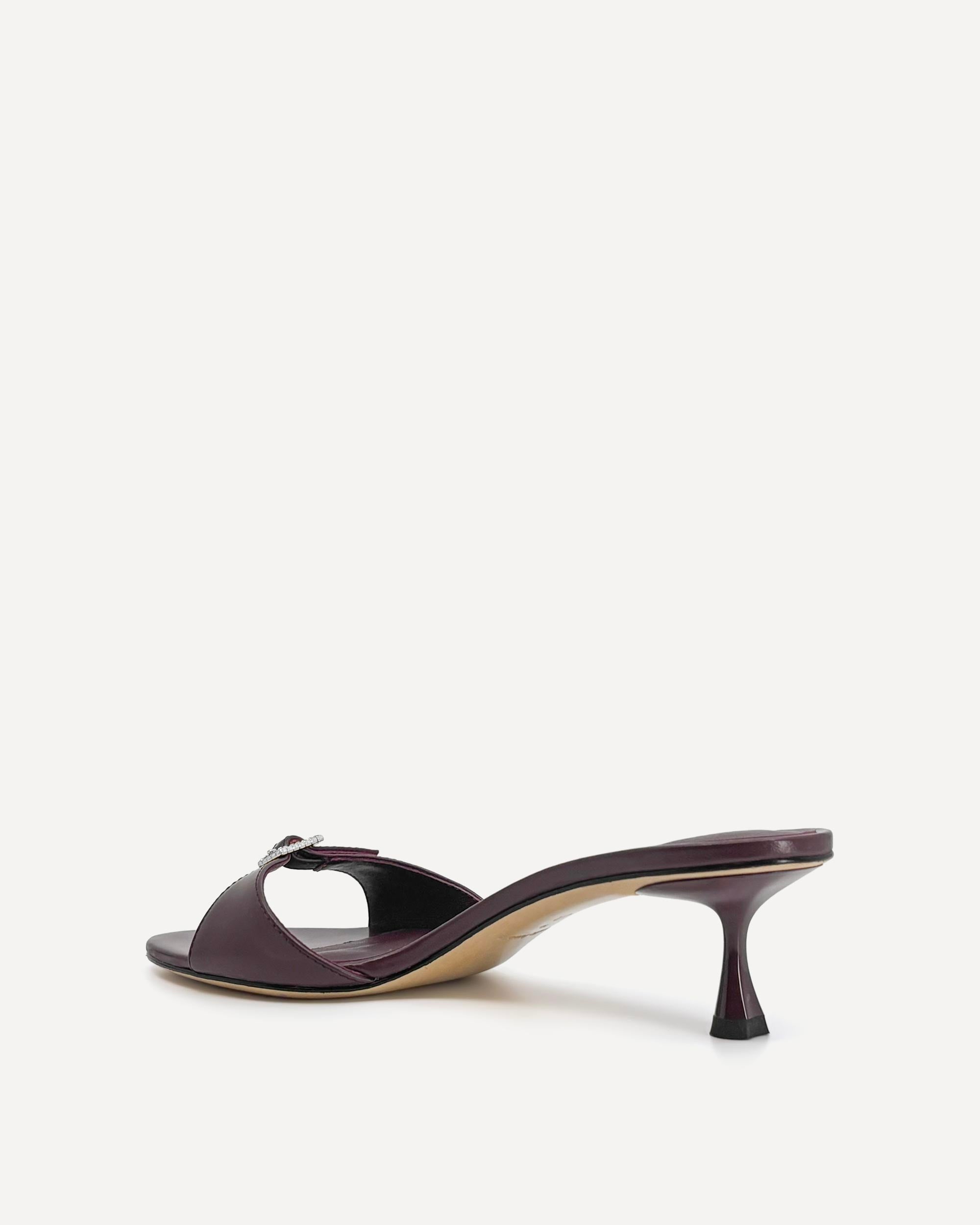 Burgundy sandal on a white background