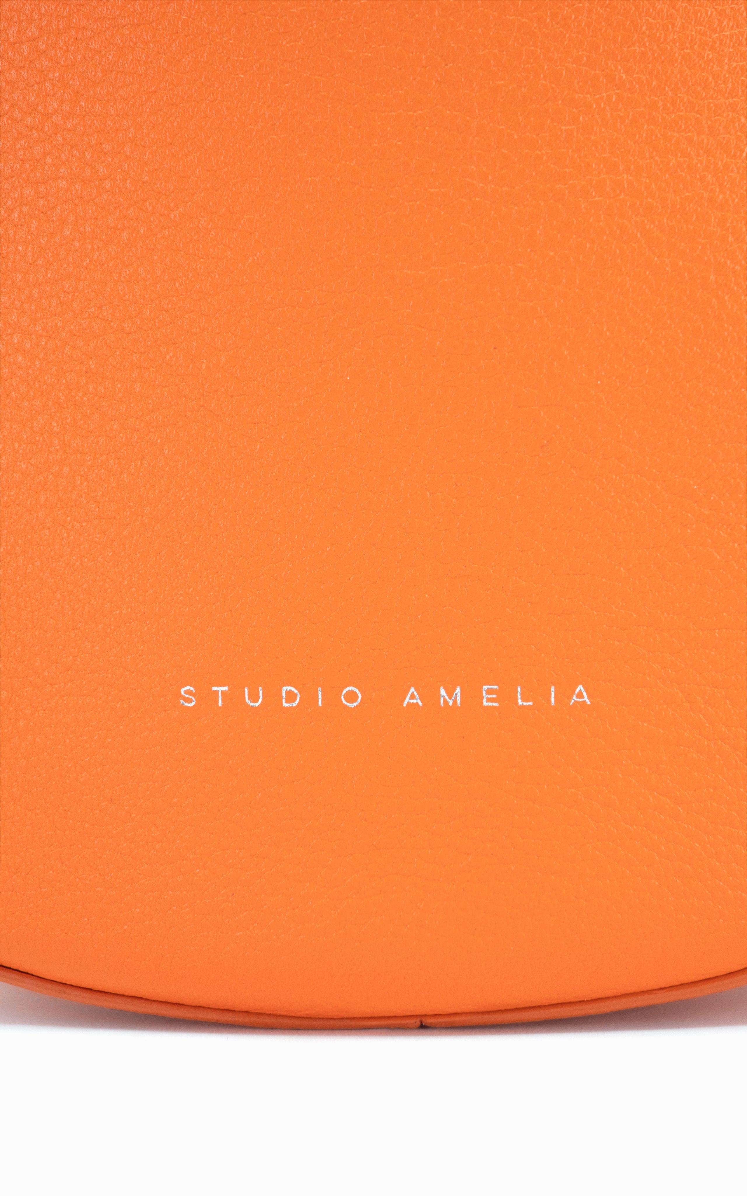 orange premium leather round handbag