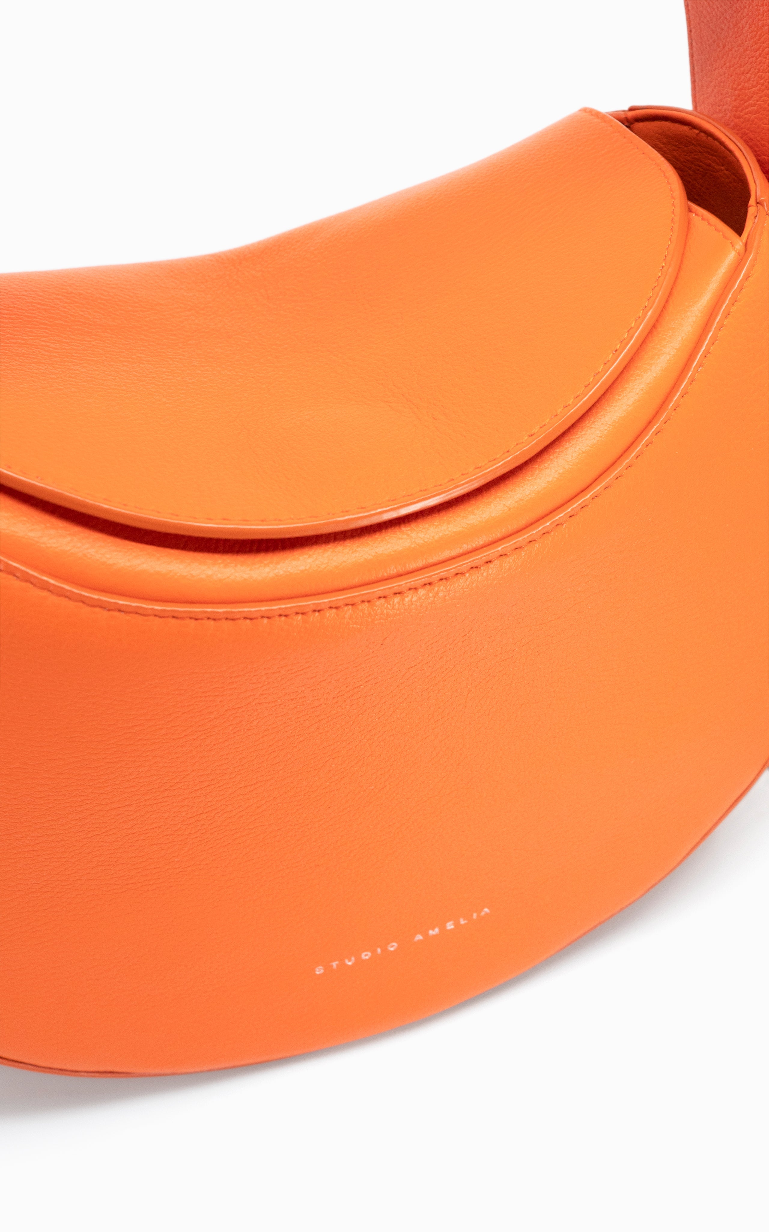 orange premium leather round handbag