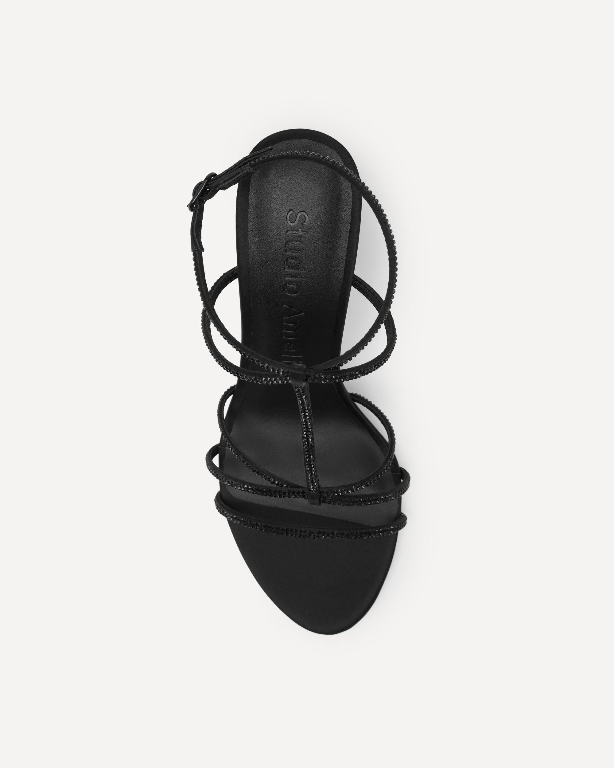 Black high heeled shoe with black diamante thin straps