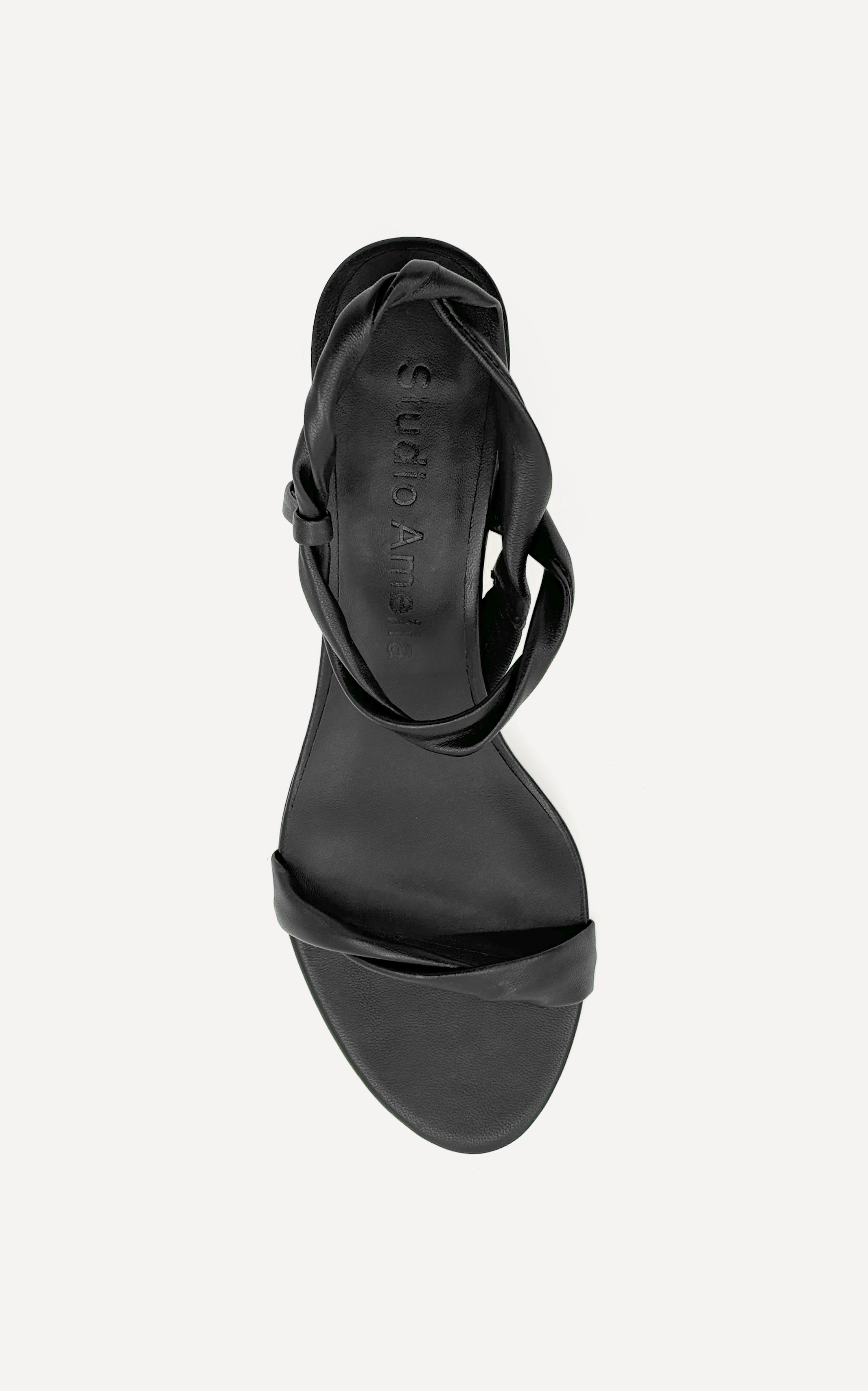 A black strappy leather kitten heel shoe
