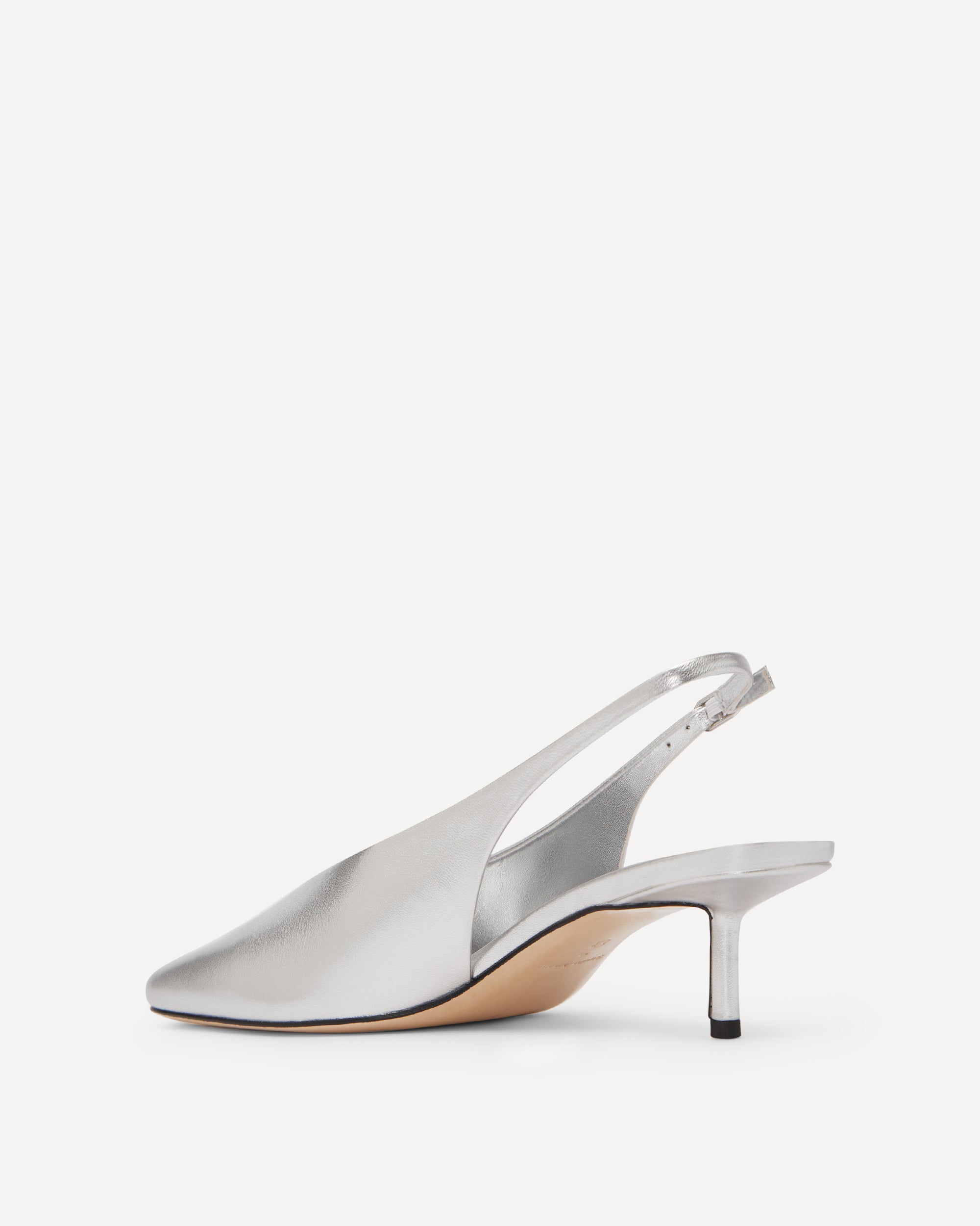 Silver slingback shoe on a white background