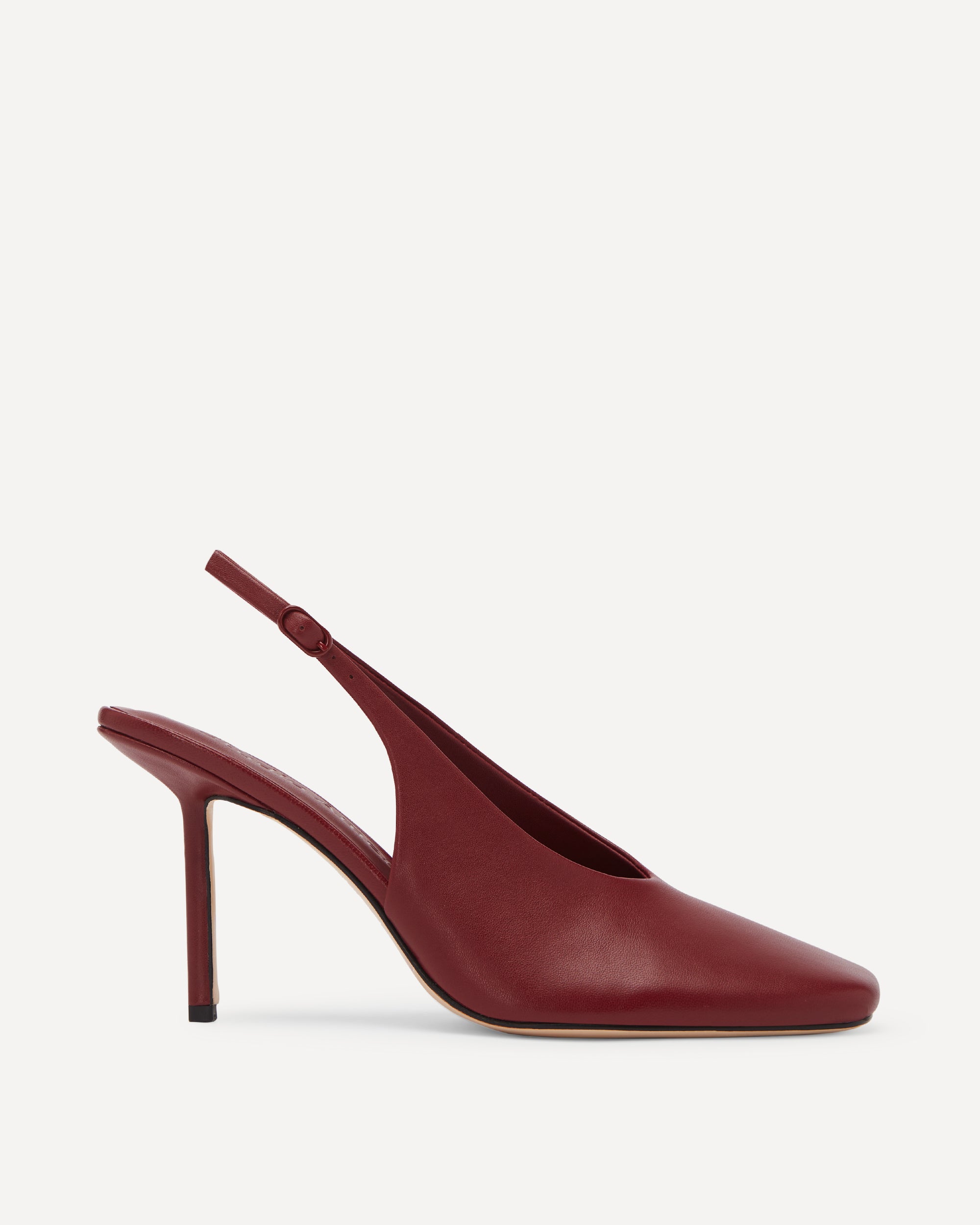 Maroon slingback high heel shoe on a white background