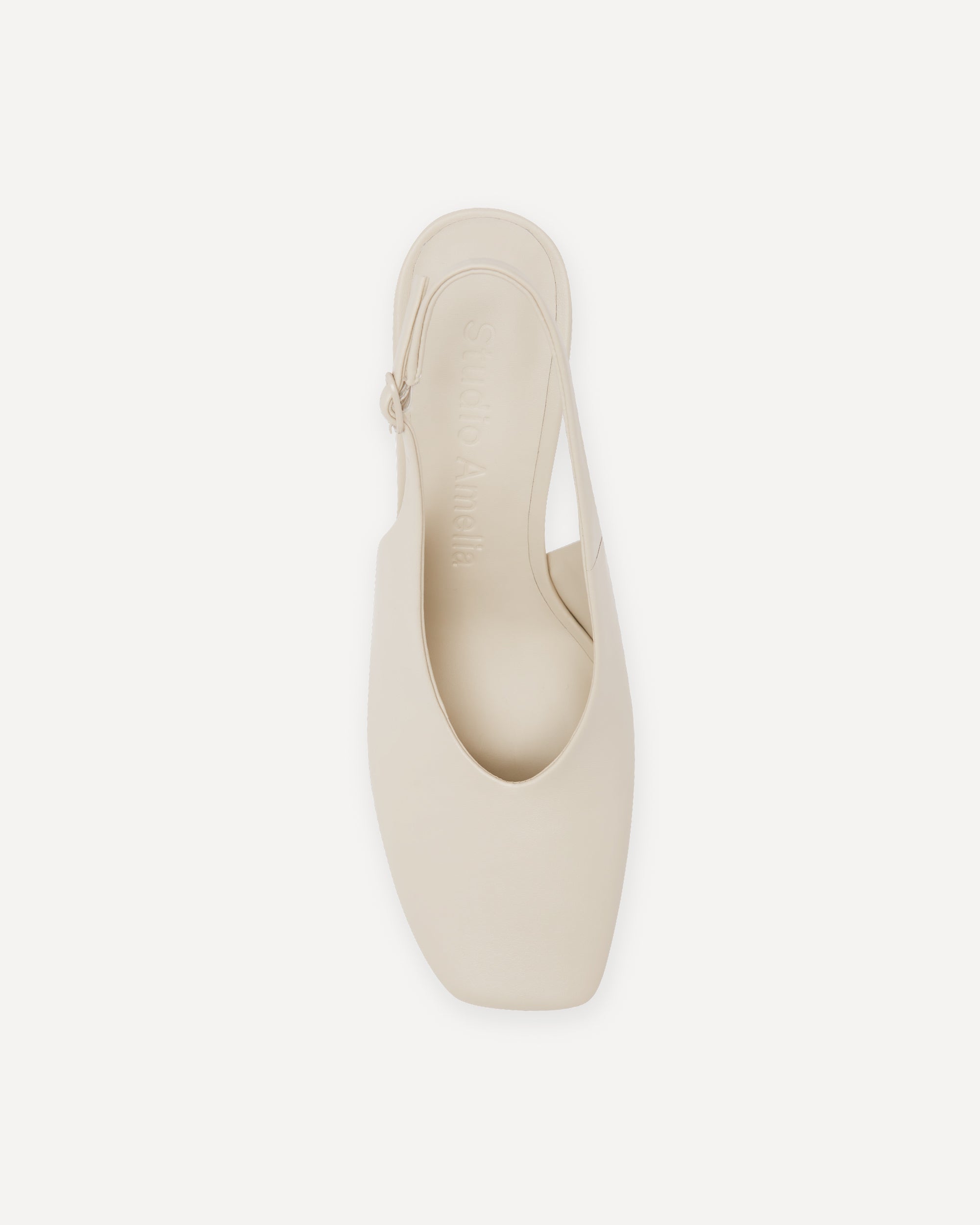 Cream coloured leather heels with square toe