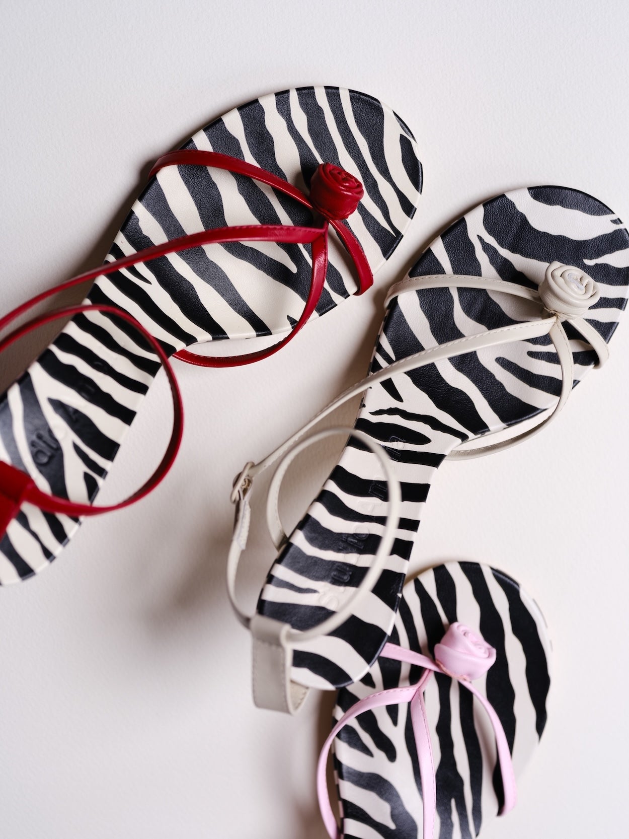 red and white leather zebra printed sandals