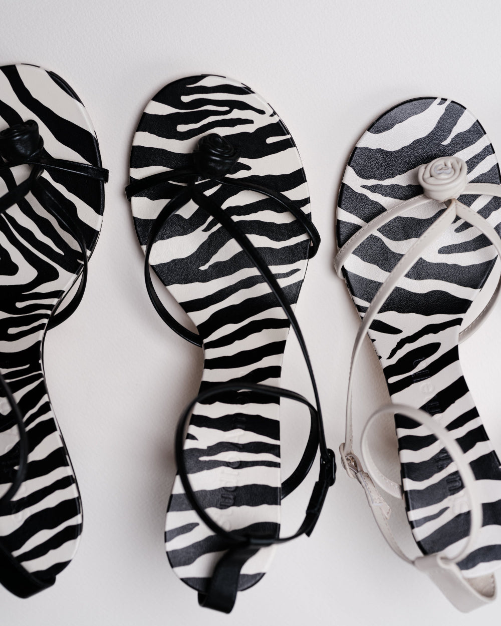 Black and white leather strappy sandals