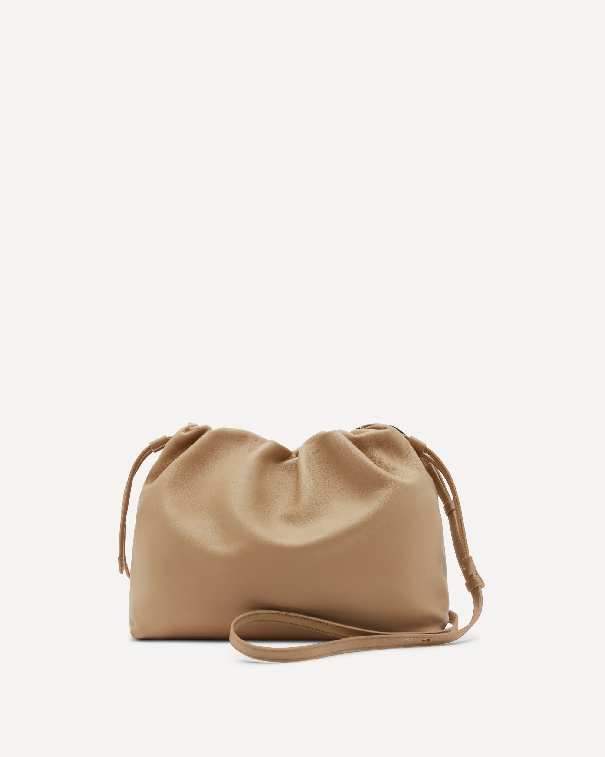 Beige handbag with a strap on a white background