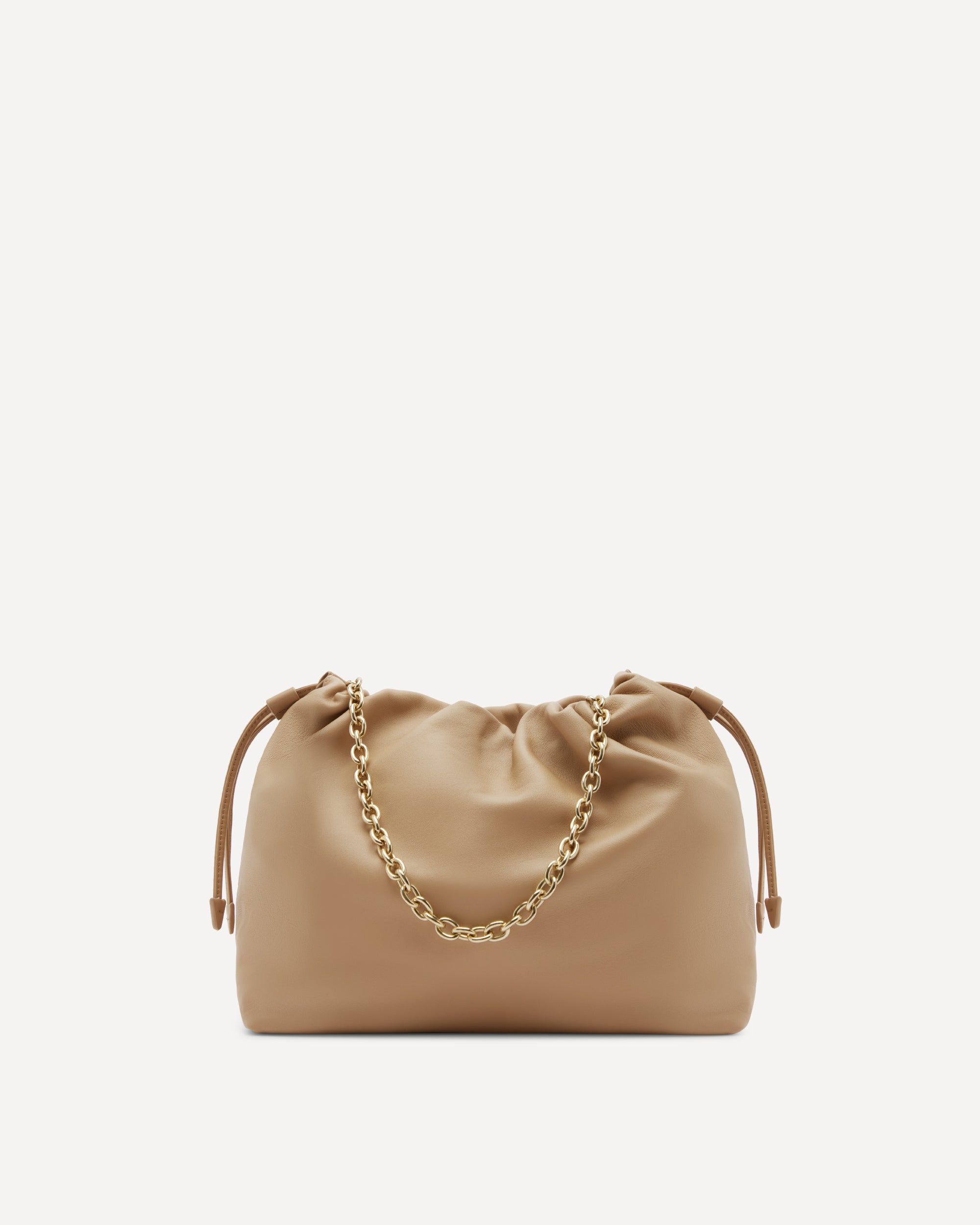 Beige handbag with a gold chain strap on a light beige background