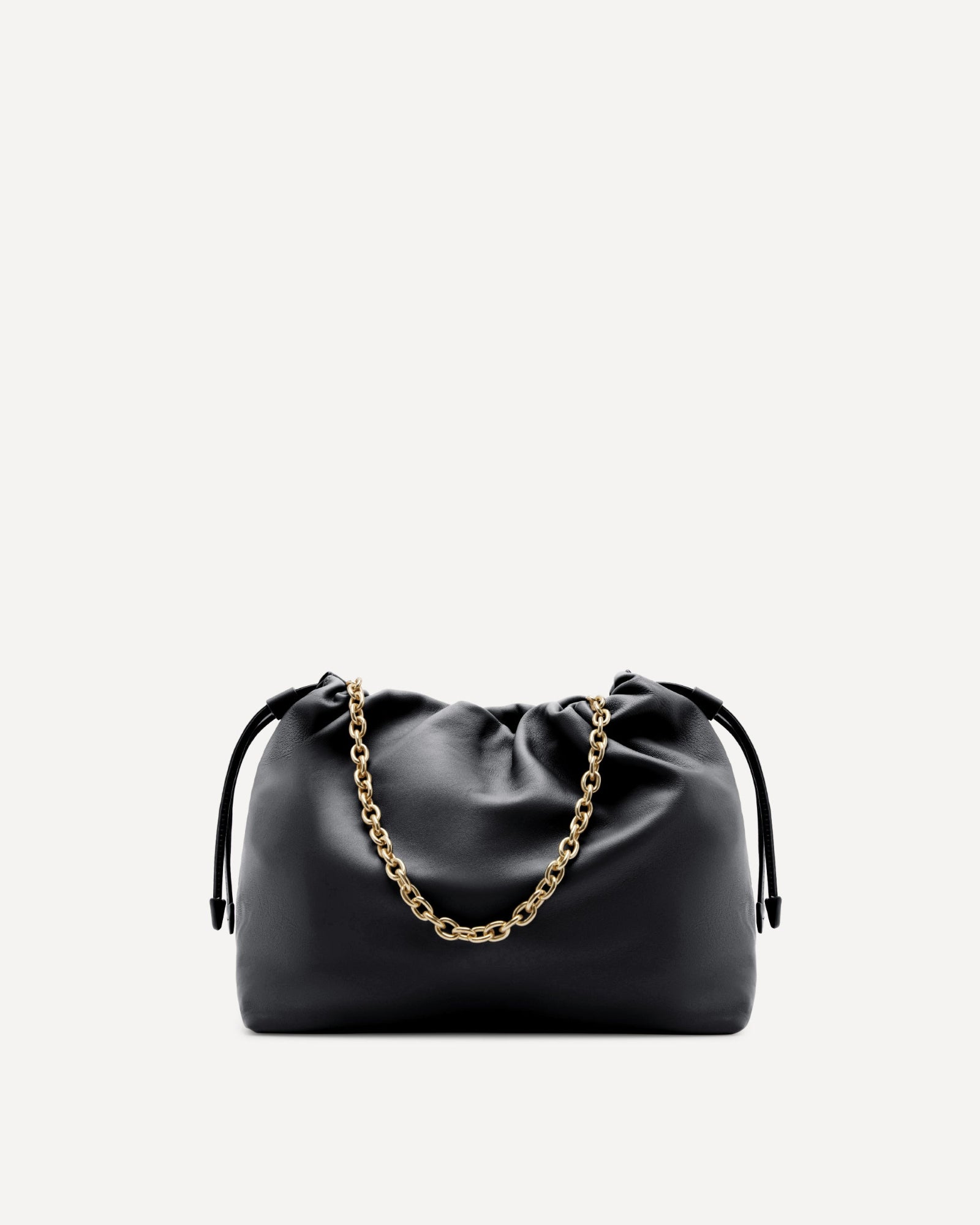 Black drawstring bag with a gold chain on a light gray background