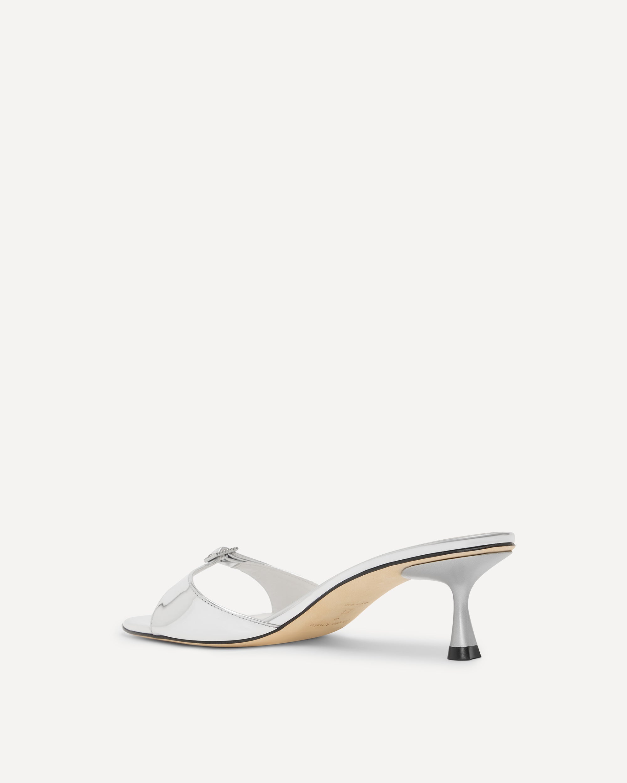 Silver kitten heel on a white background