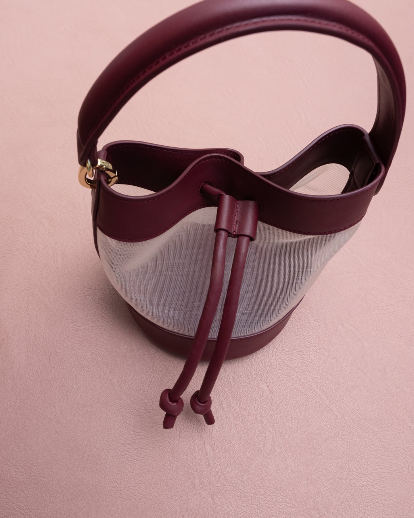 Maroon handbag with drawstrings