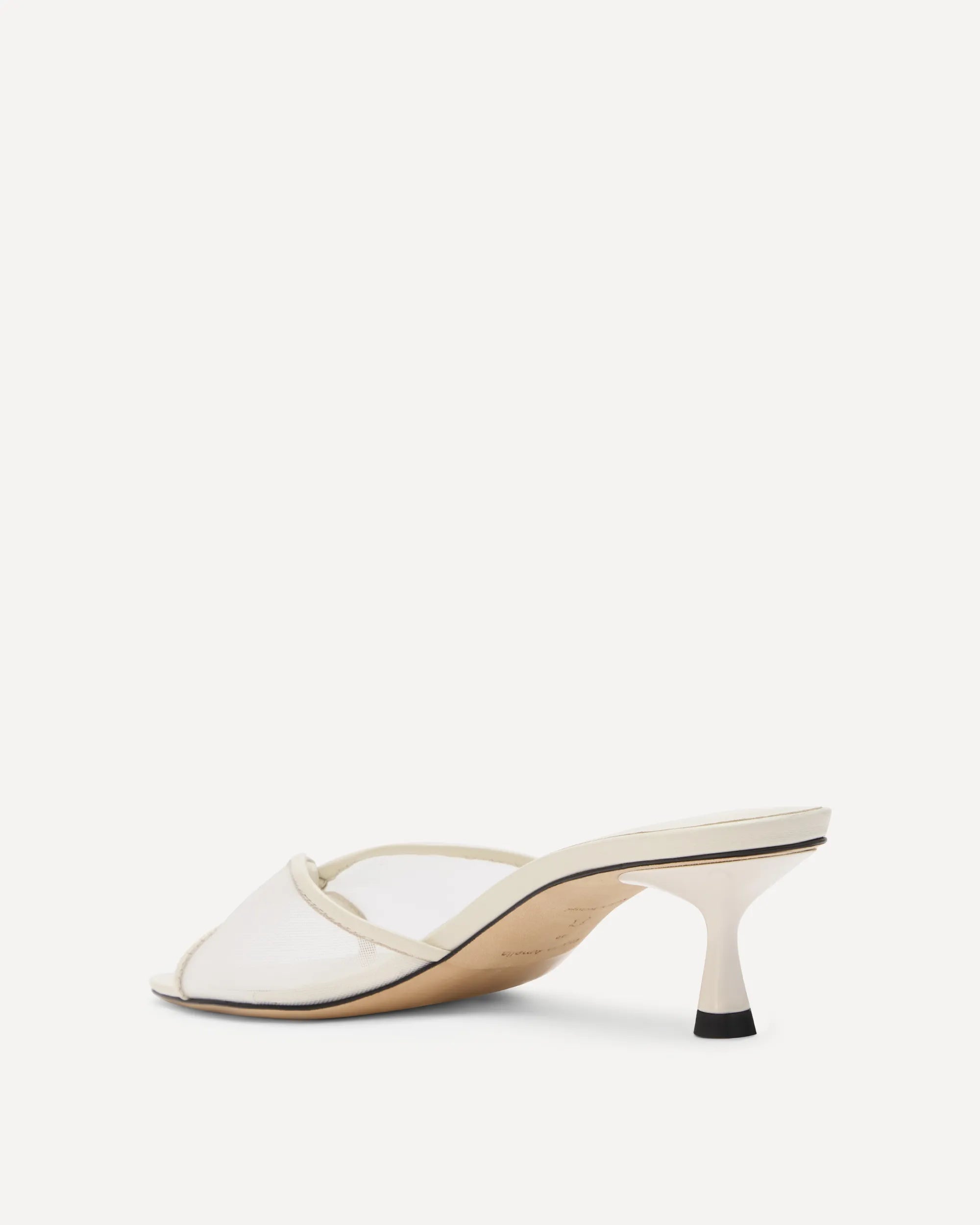white leather sandal with a kitten heel