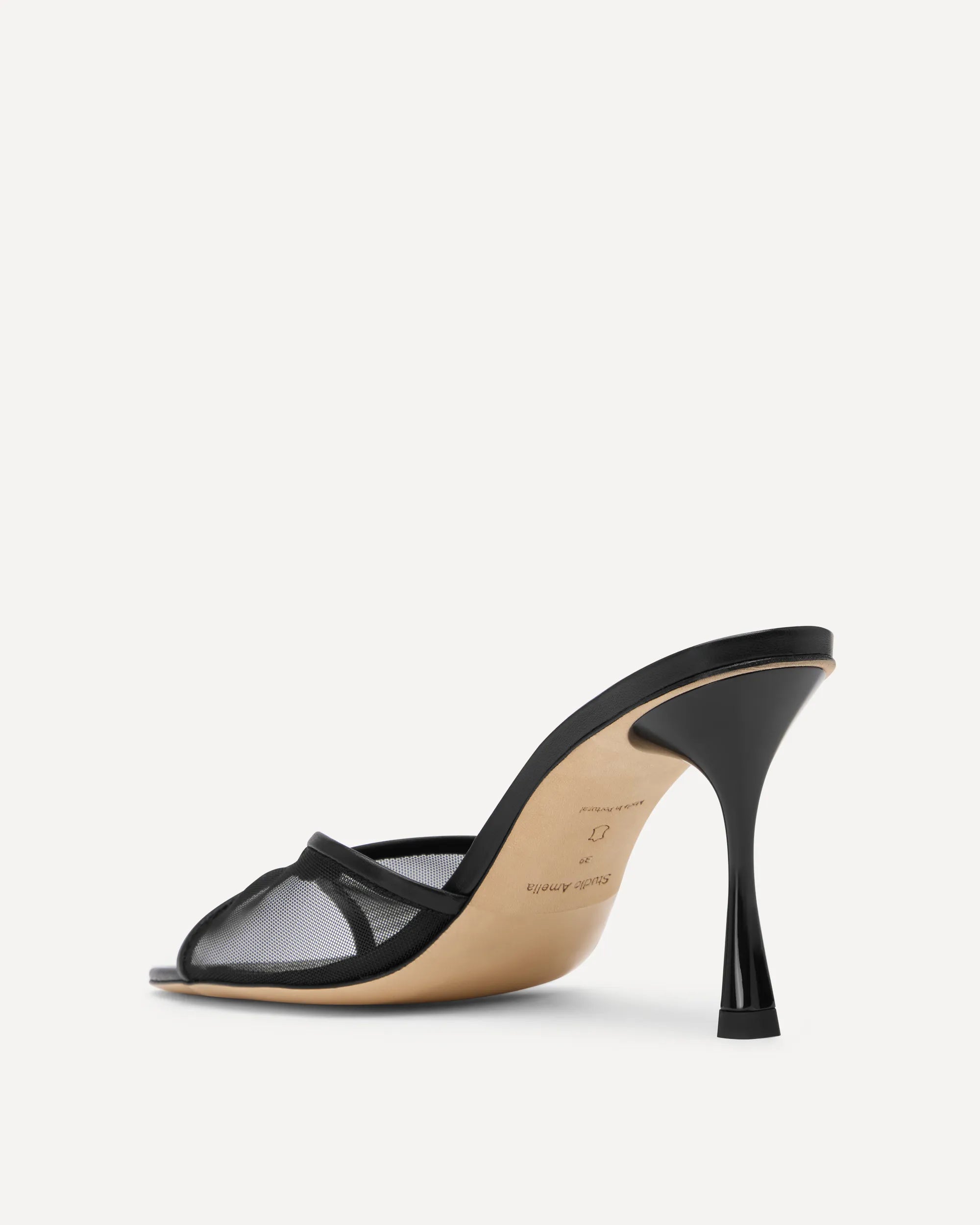 Black high heeled leather sandal with mesh upper
