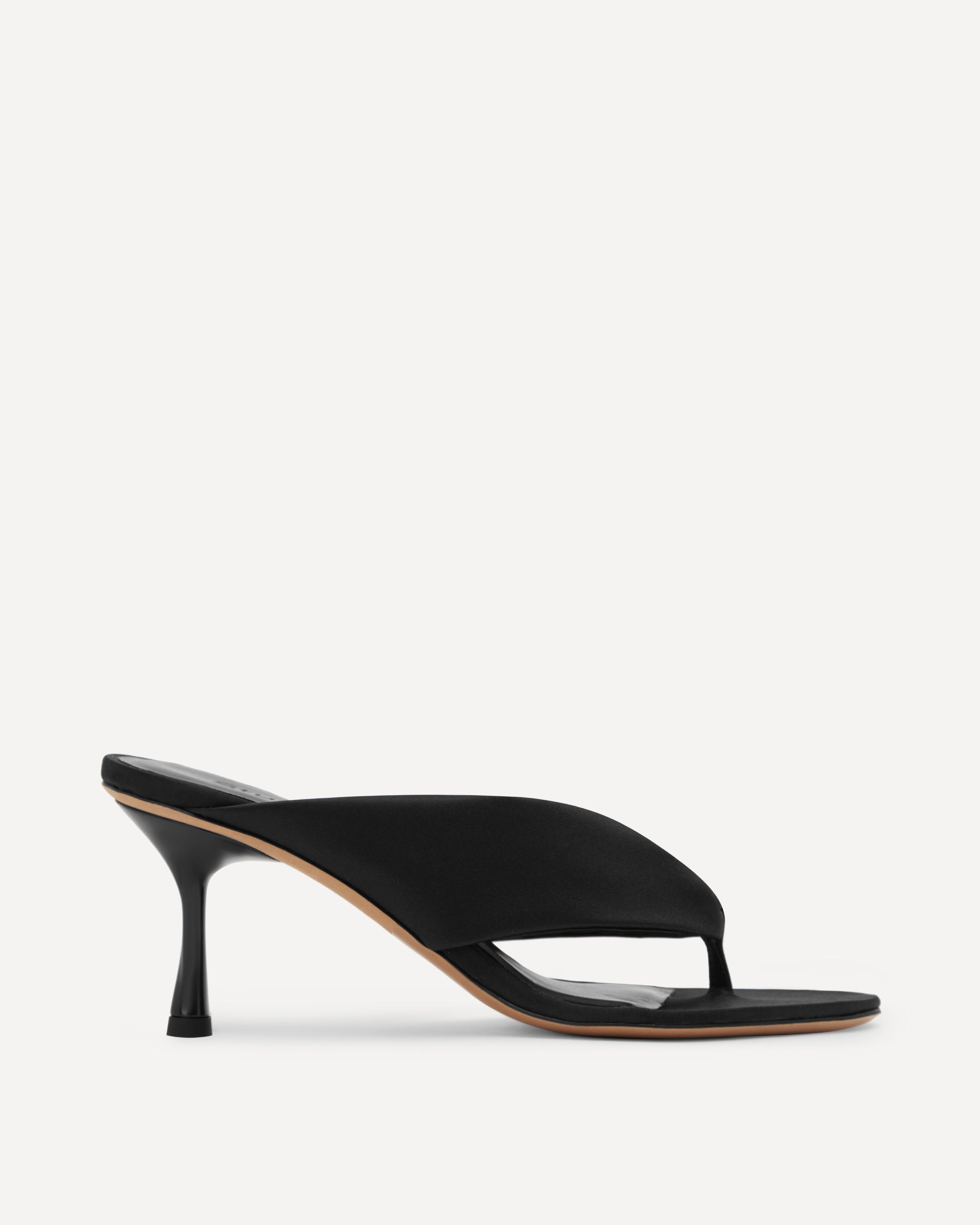A black silk flip flop sandal with a medium heel