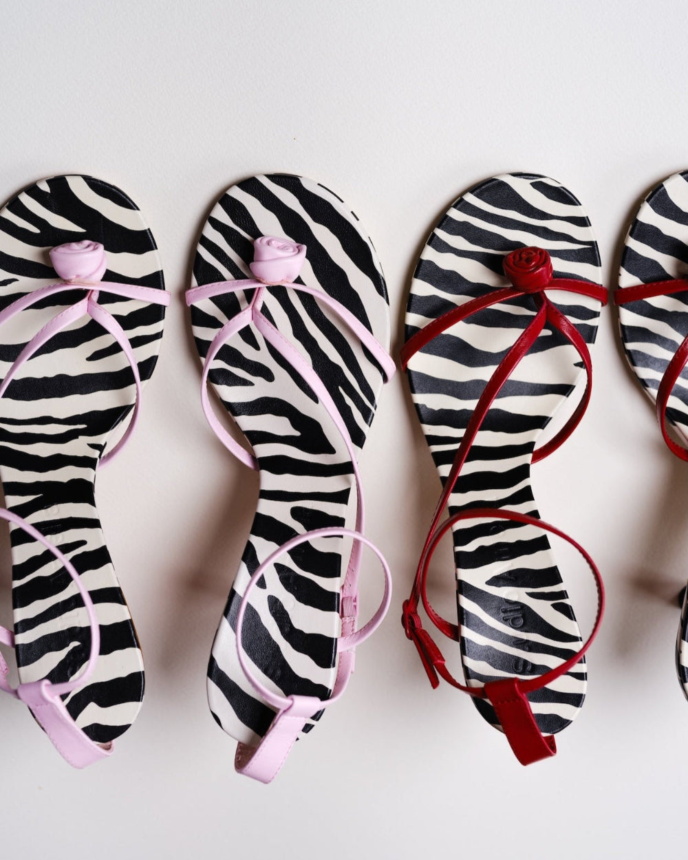 Pink and red leather sandals with zebra print