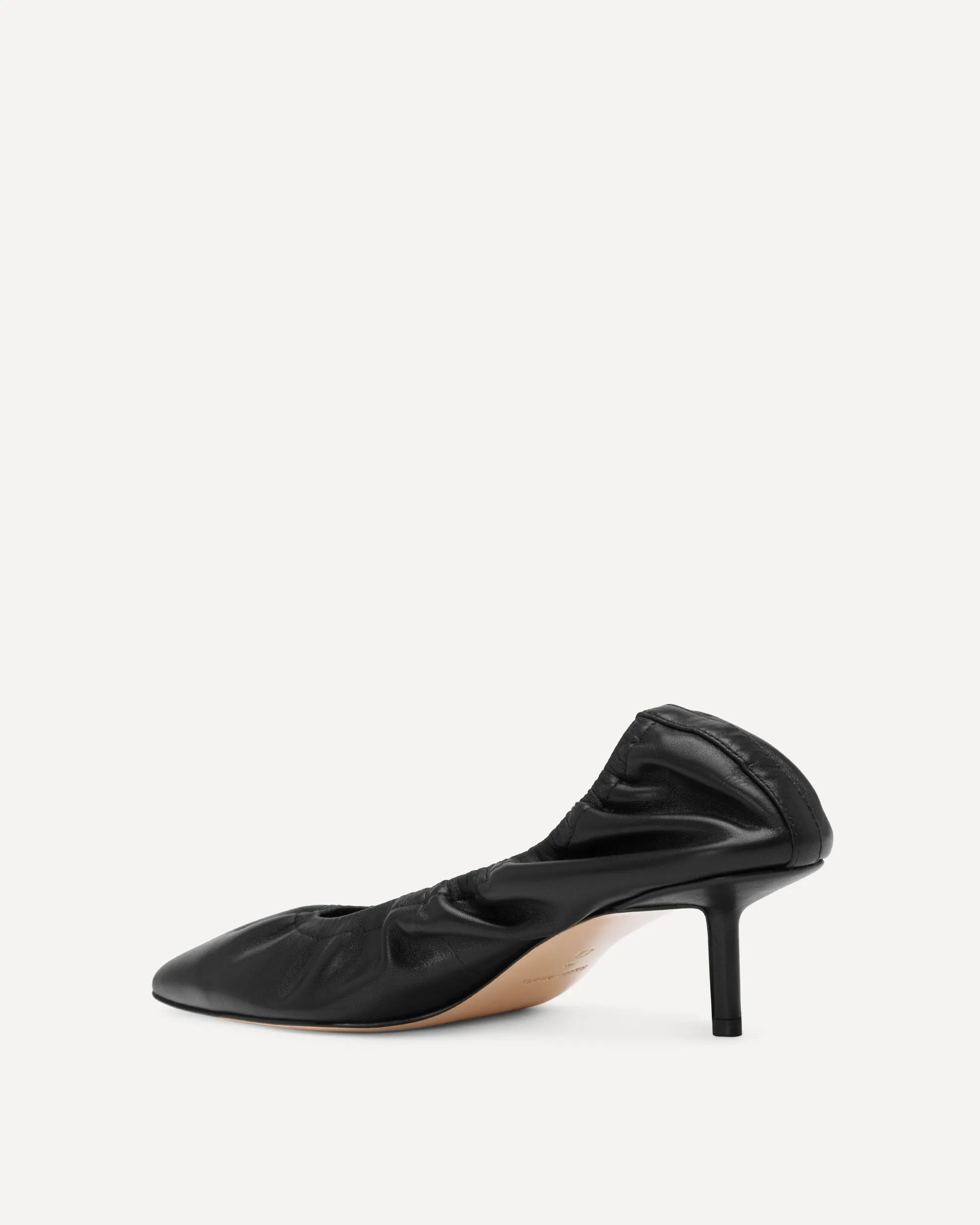 Black pointed toe pumps with a kitten heel