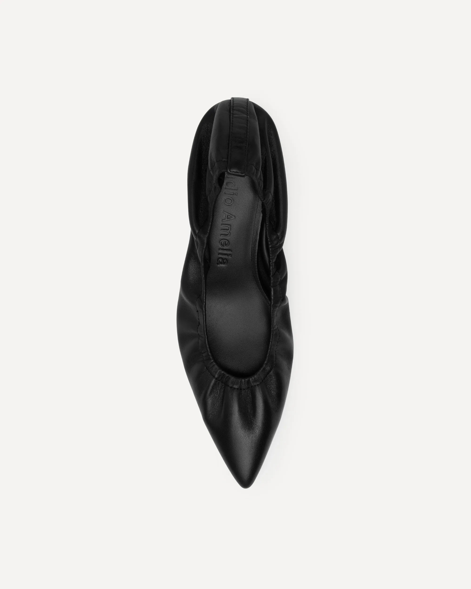 Black pointed toe pumps with a kitten heel