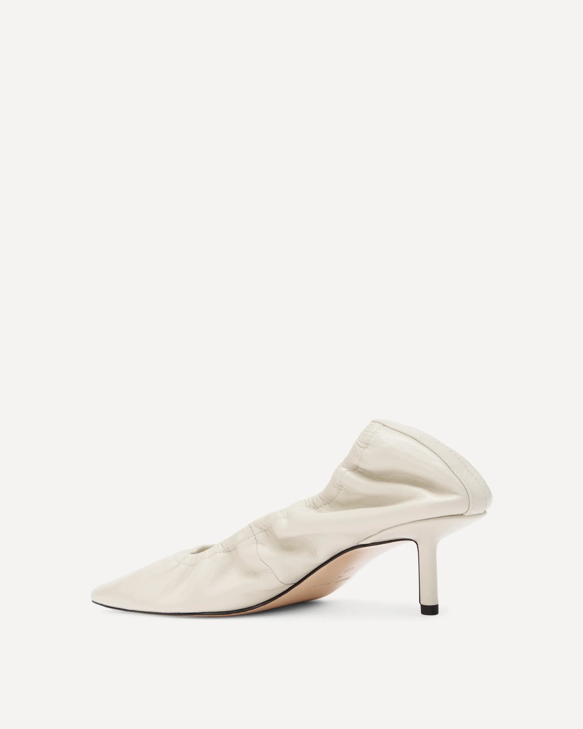 White pointed toe kitten pump