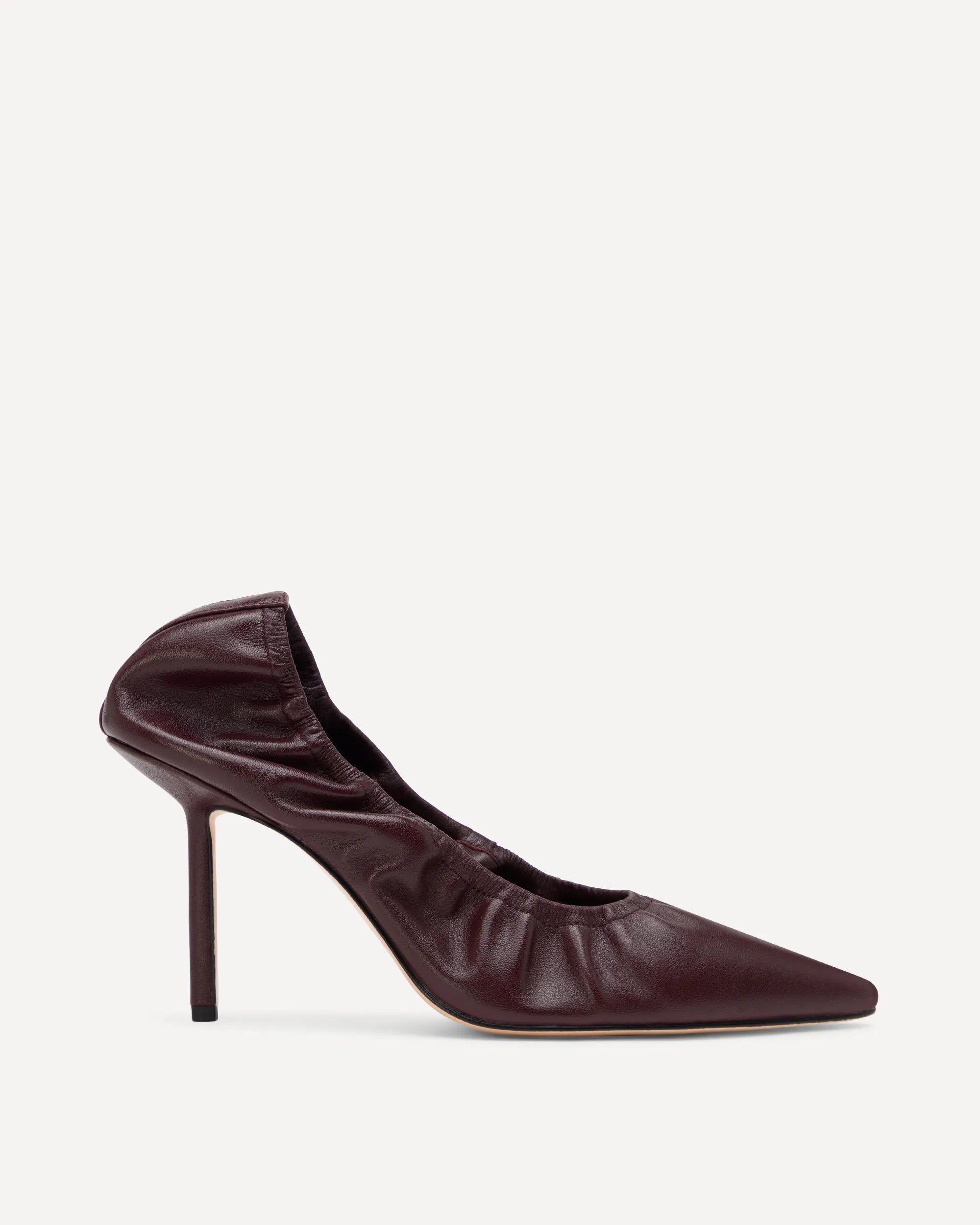 Brown high-heeled shoe on a white background
