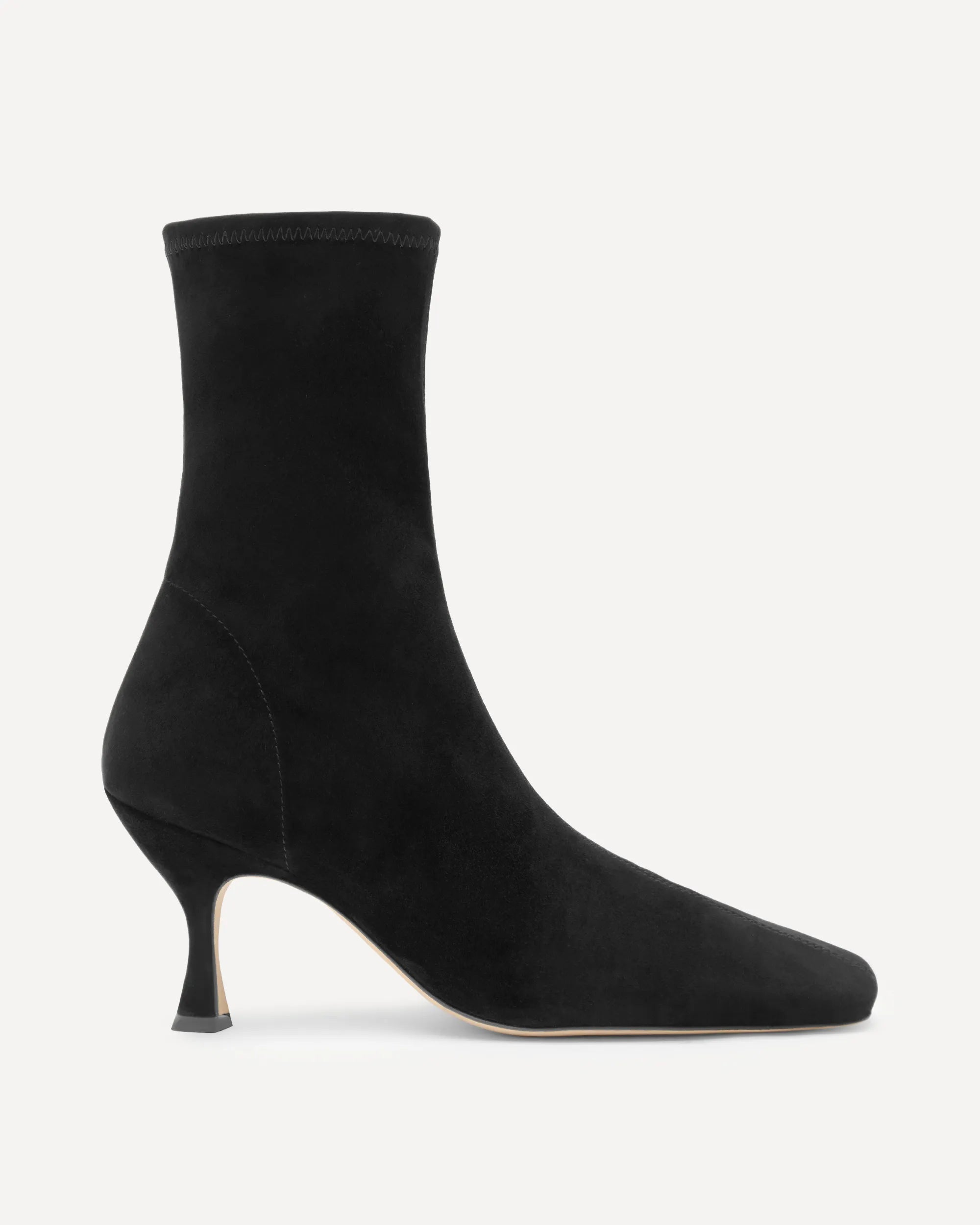 Black sock boot with a slight heel on a white background