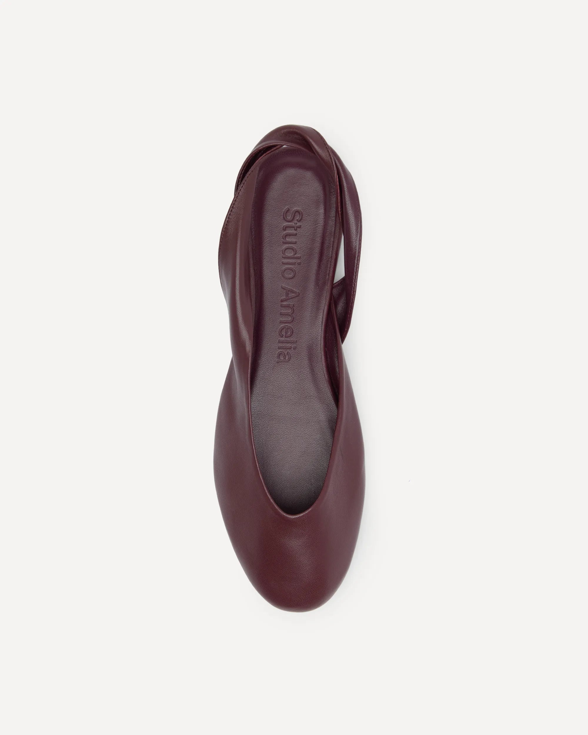 Burgundy leather flats with slingback design