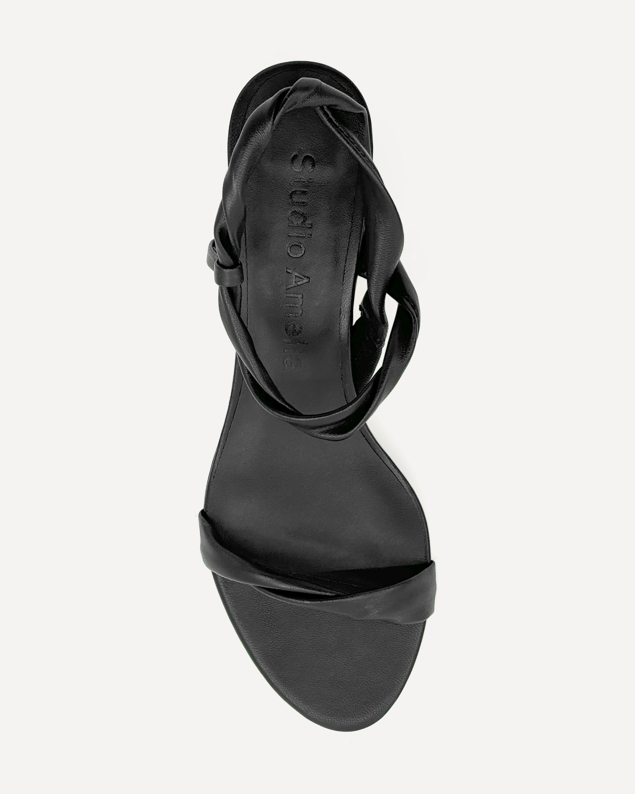 A black strappy leather kitten heel shoe