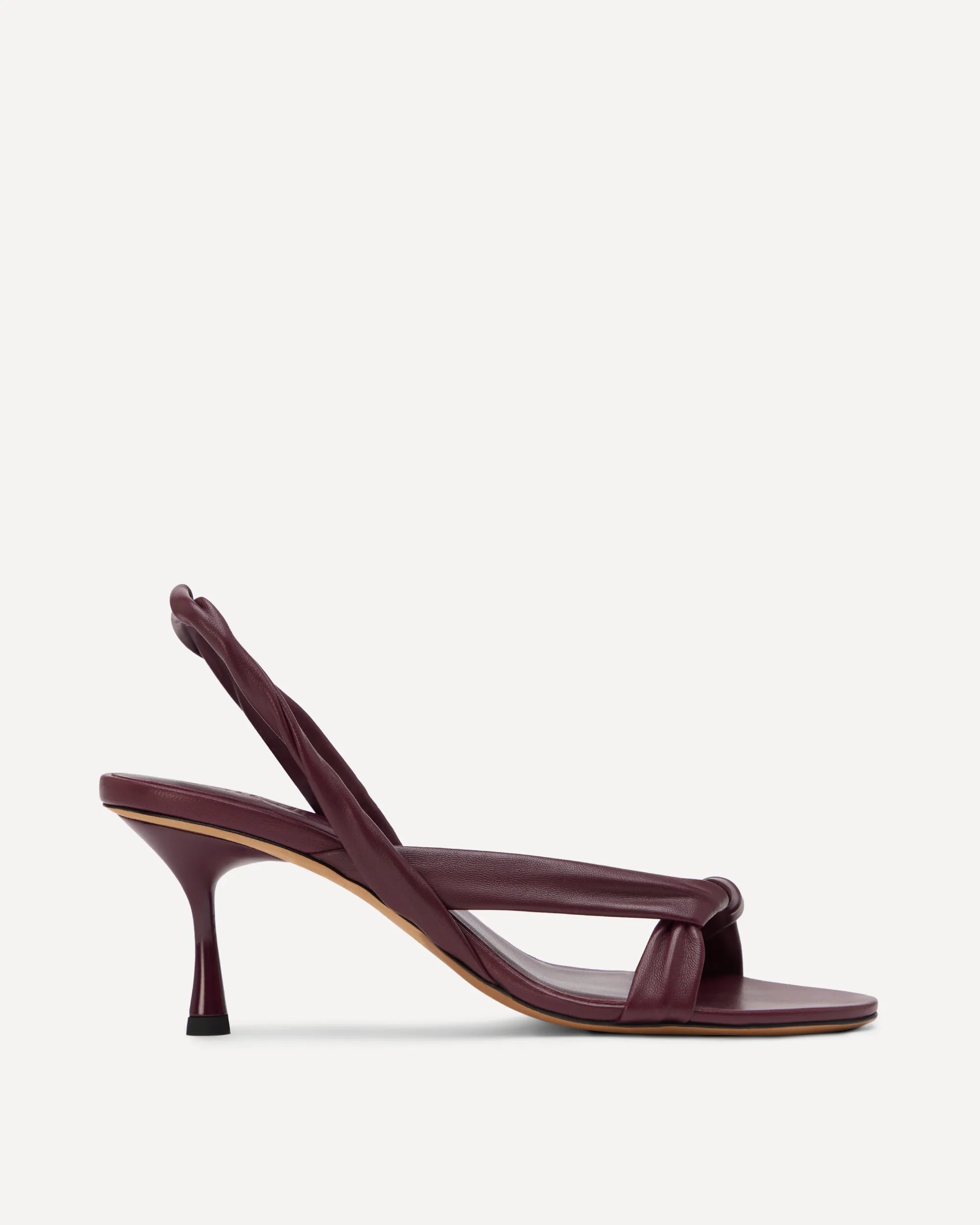 Burgundy high-heeled sandal on a light gray background