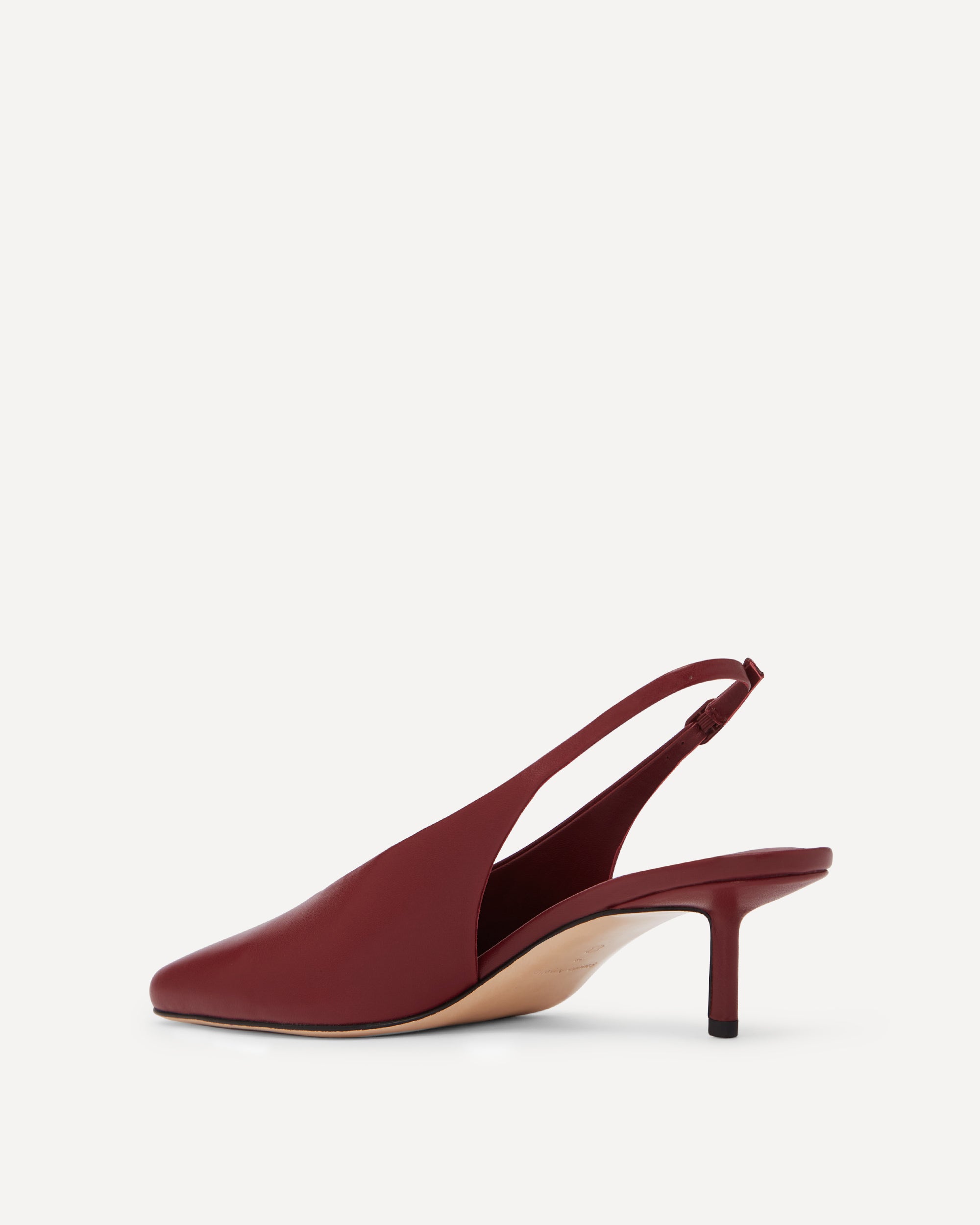 Maroon coloured slingback pump on a short heel