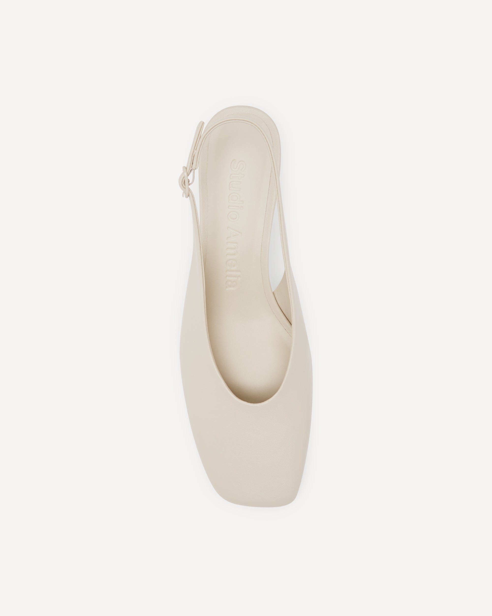 A cream coloured leather pump by Studio Amelia