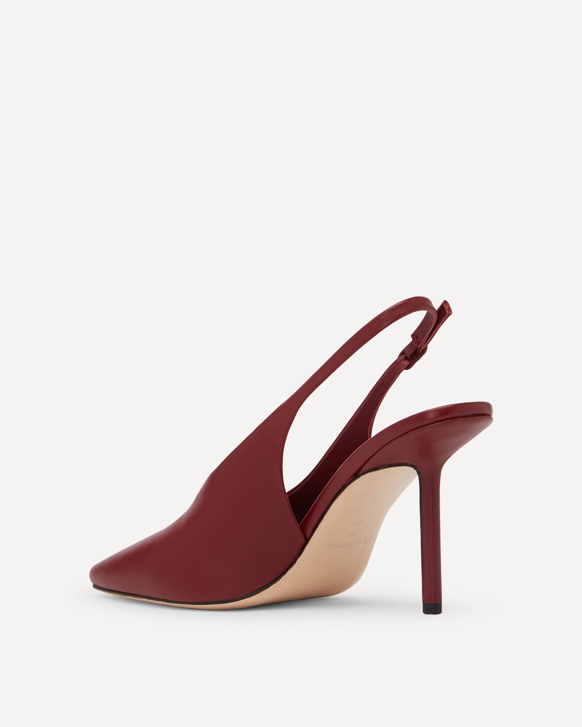 Maroon high-heeled slingback shoe on a light gray background