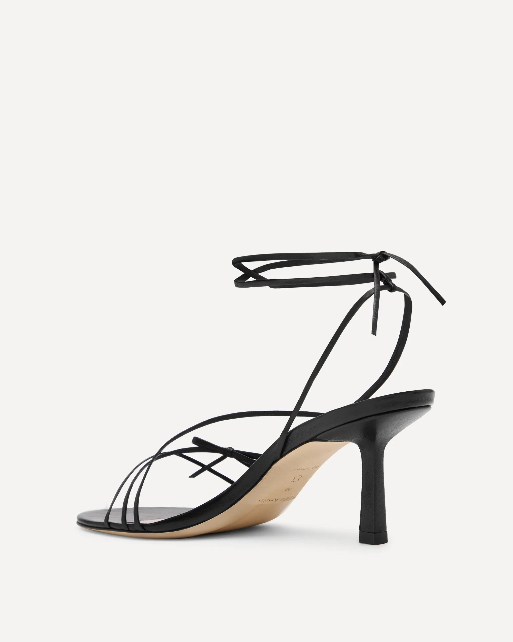 A black strappy high heel made for summer