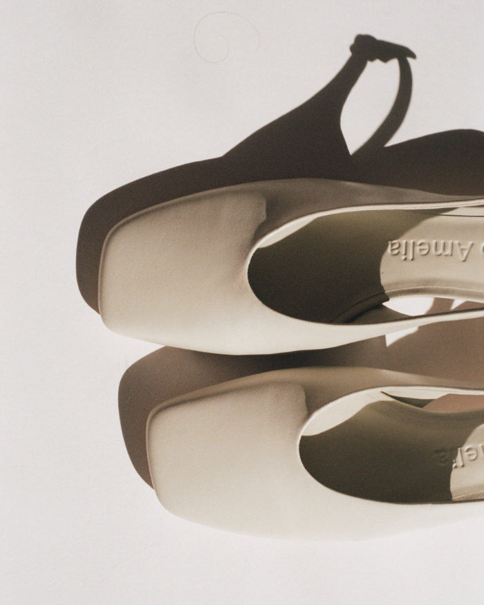 A pair of cream leather high heels from Studio Amelia