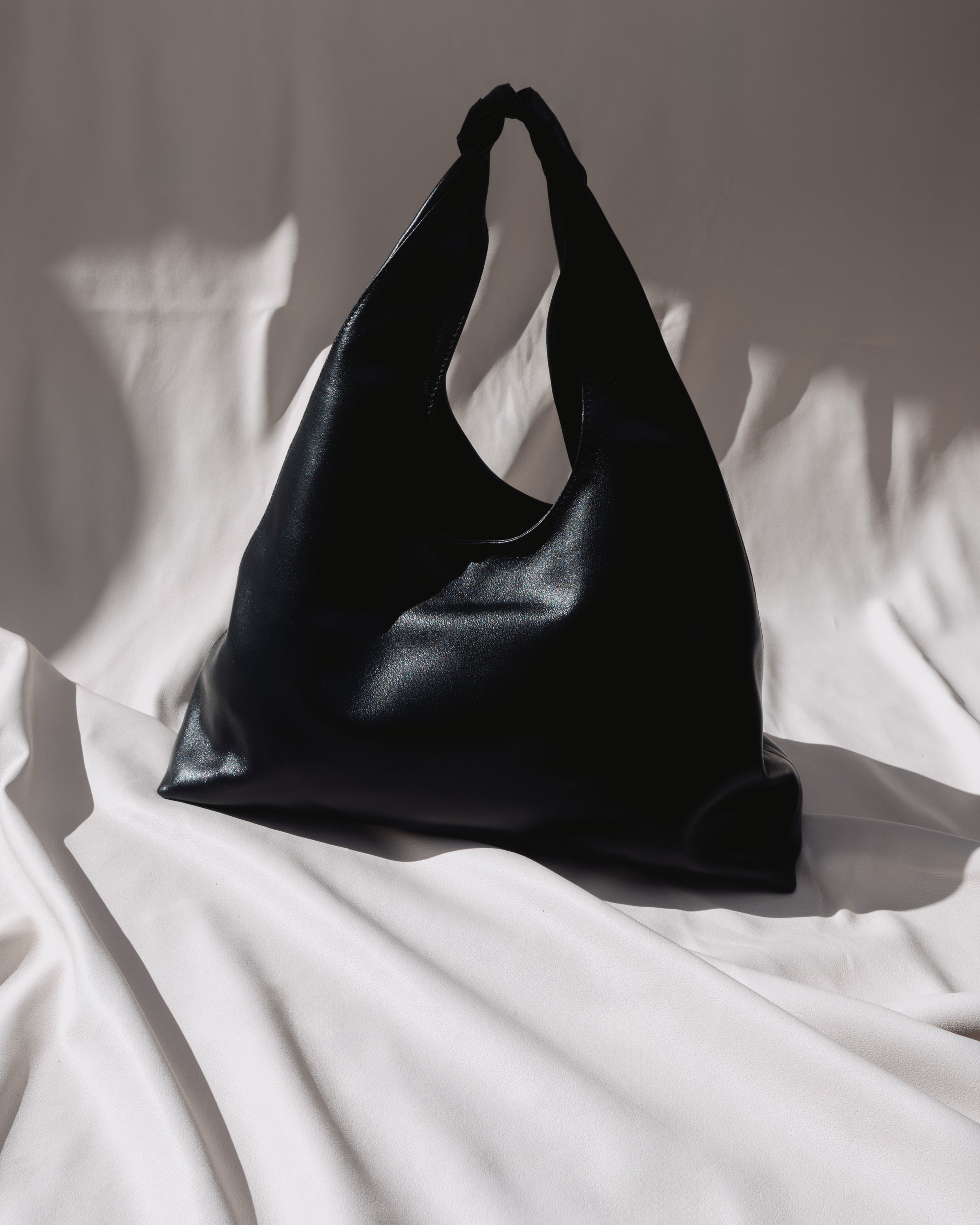 A black leather casual shoulder bag