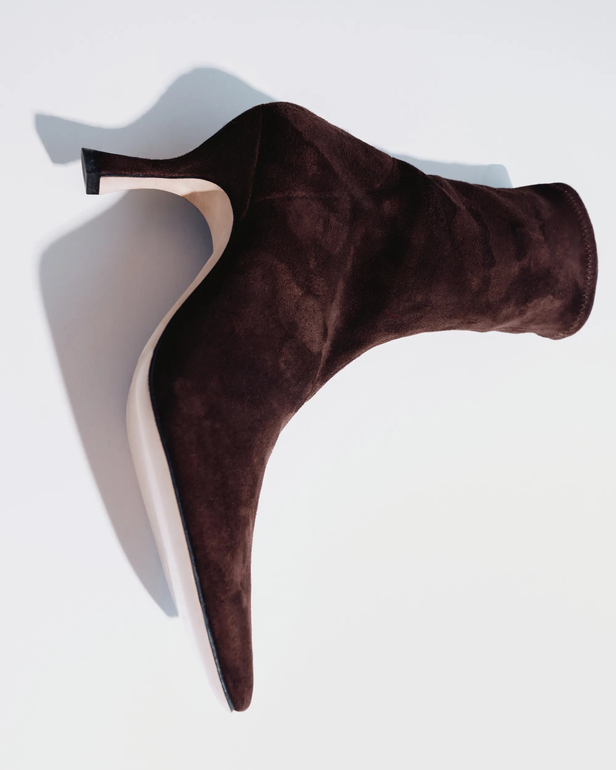 Dark brown suede boots with a mid heel