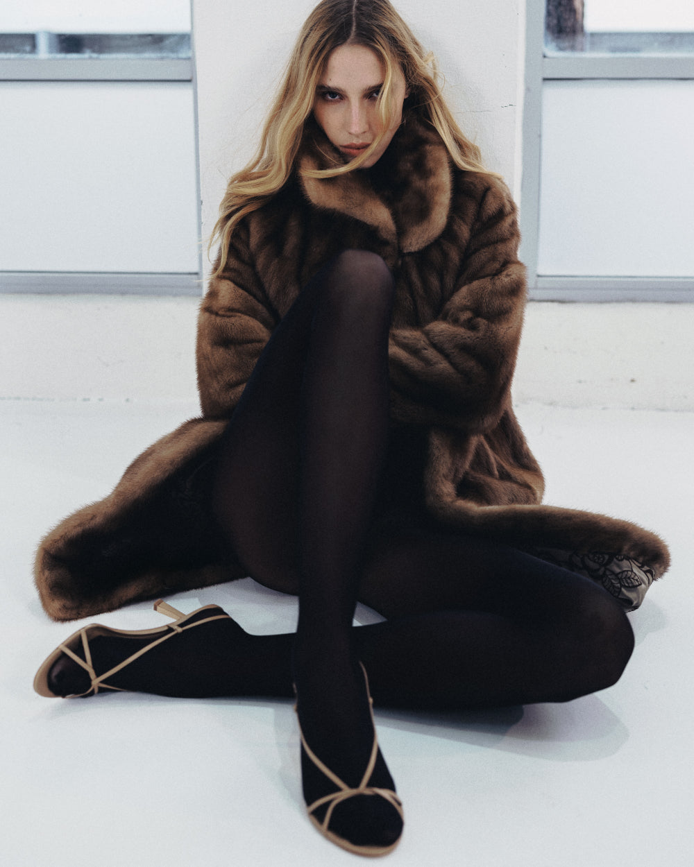 A woman wearing the Entwined 70 Heel by Studio Amelia