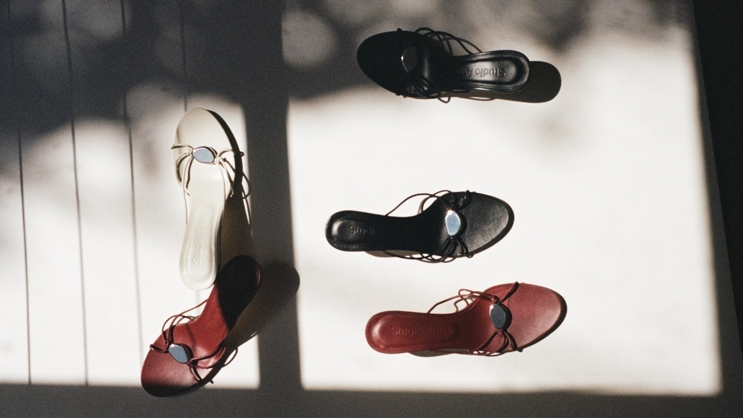 Leather sandals and slides by Studio Amelia
