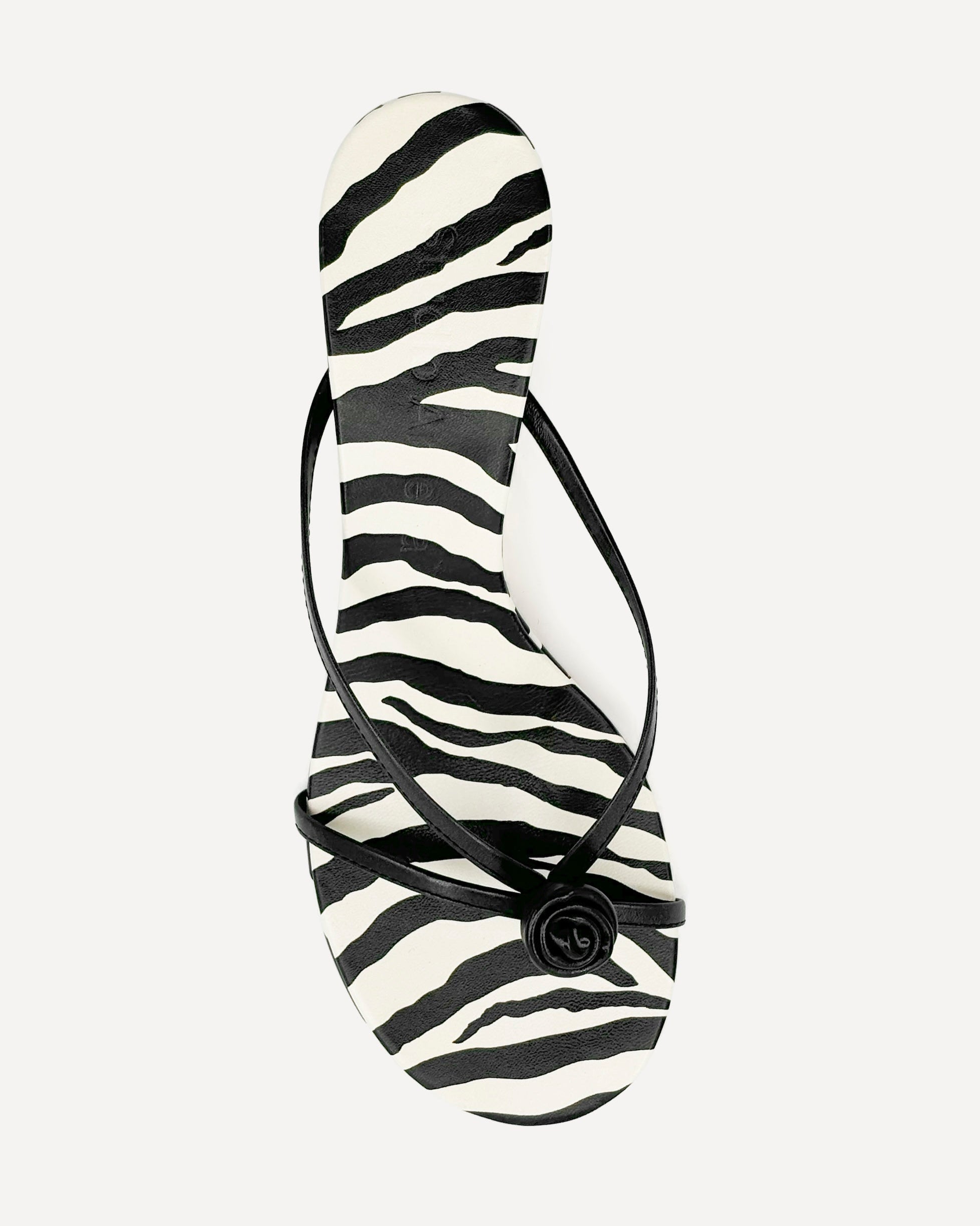 A black leather kitten heel sandal