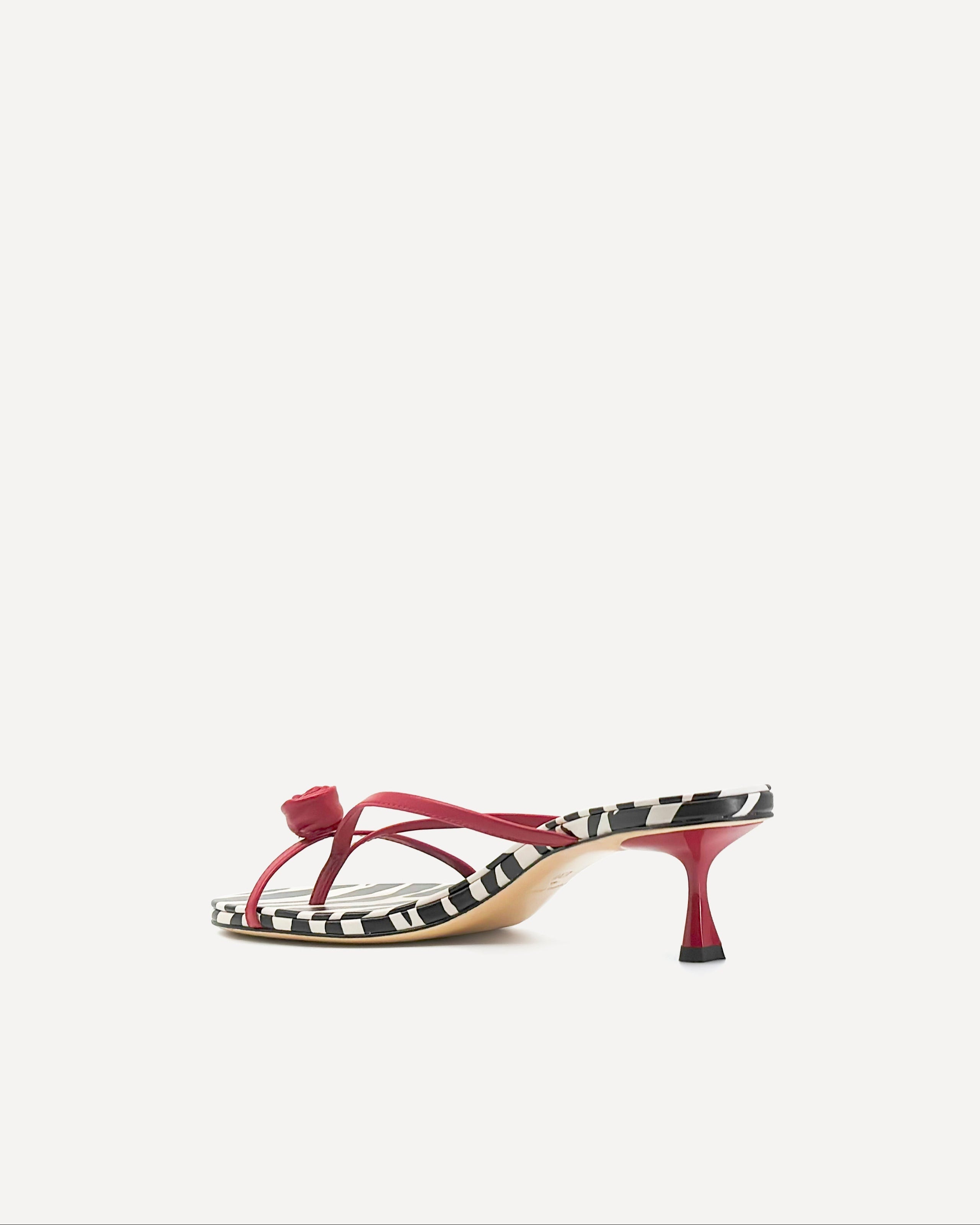A red kitten heel leather sandal