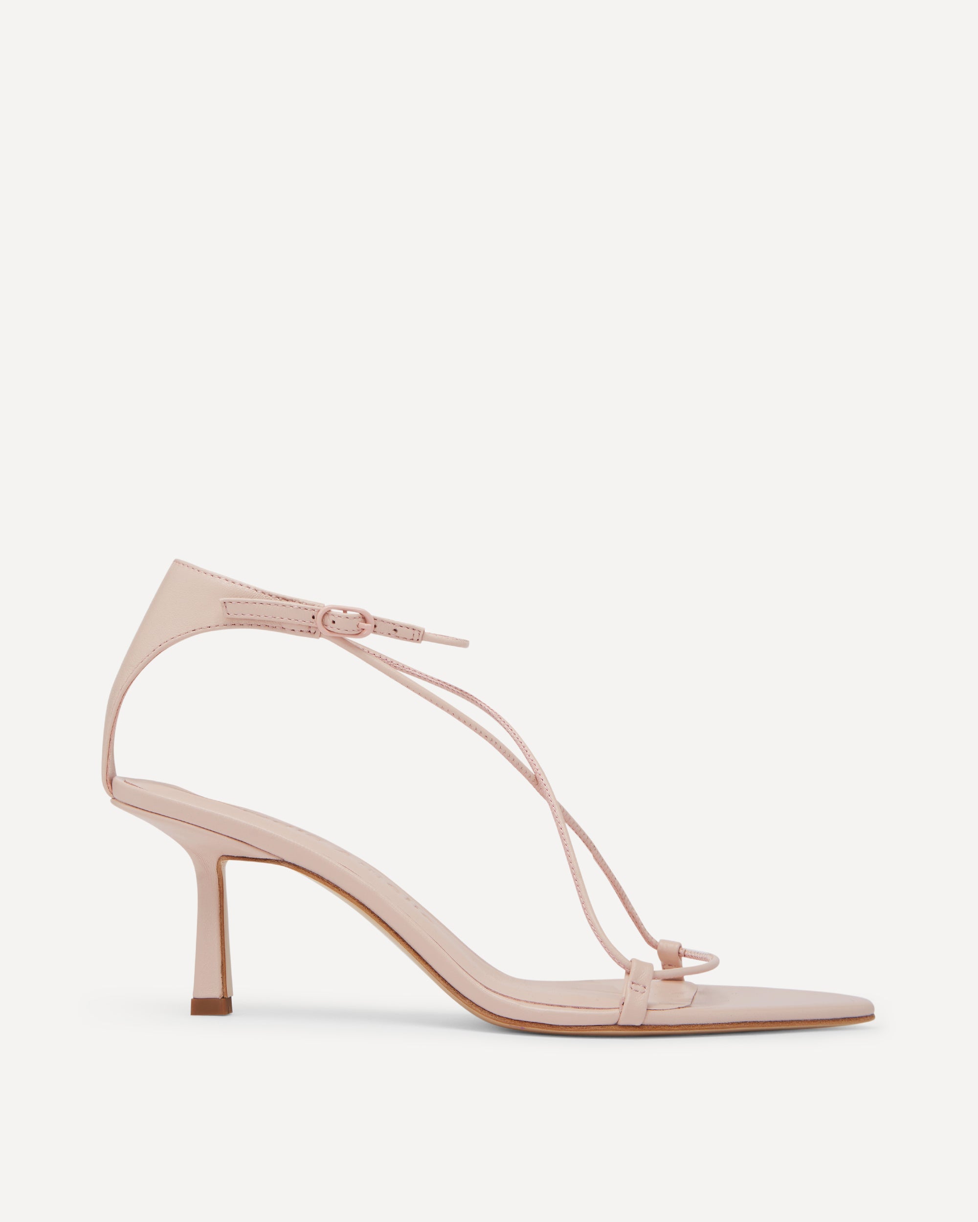 Pink high-heeled sandal with thin straps on a white background
