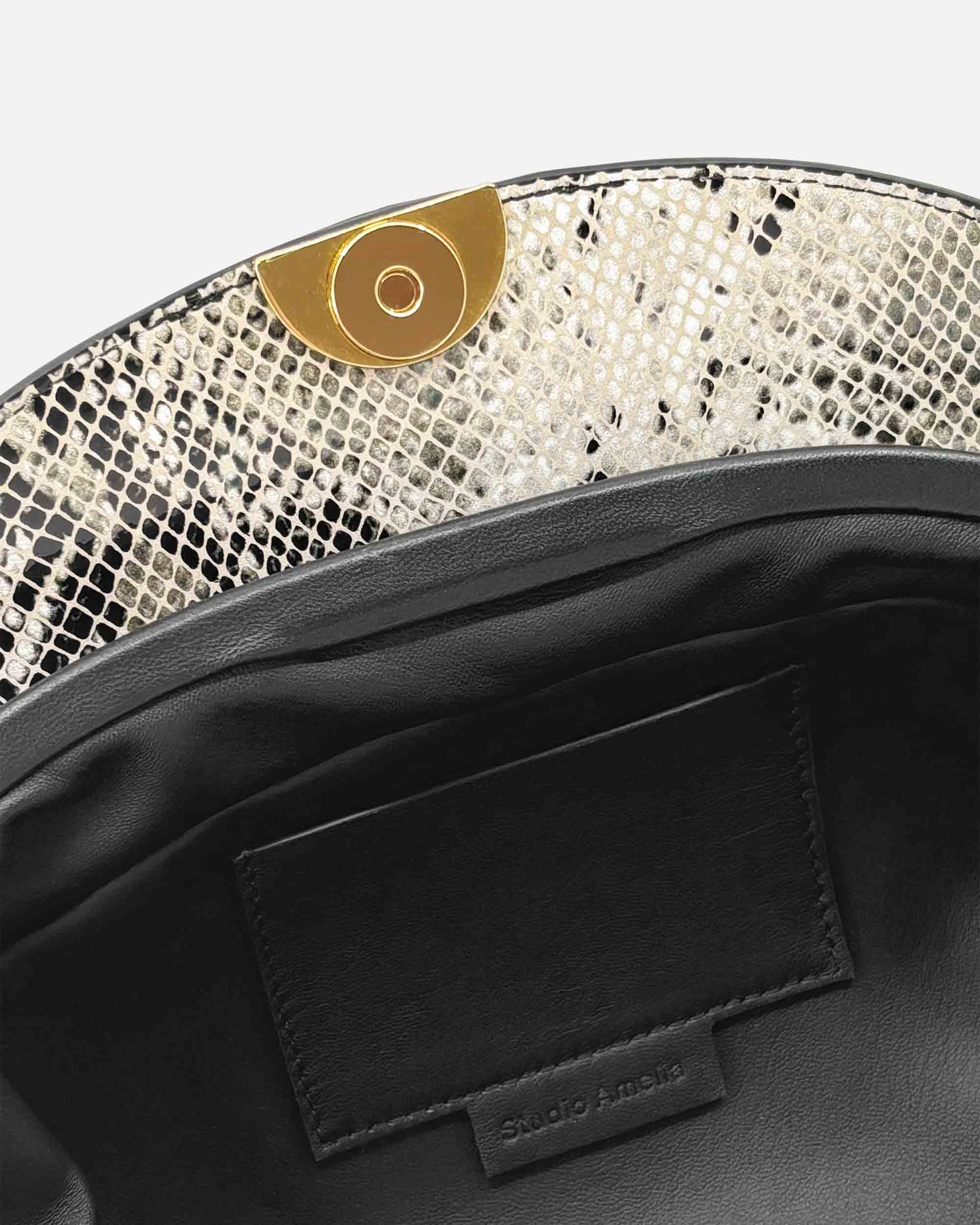 Zamora Clutch | Python