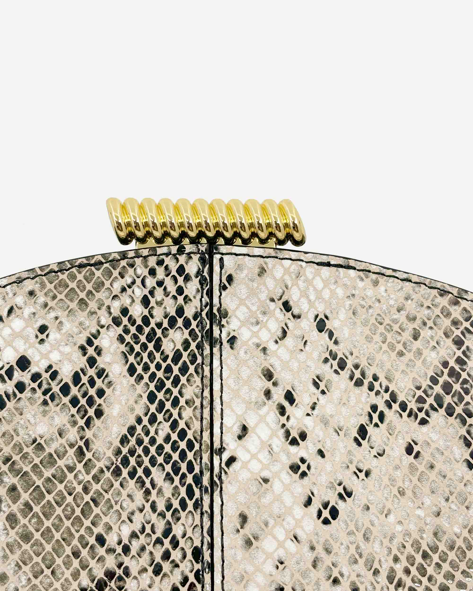 Zamora Clutch | Python