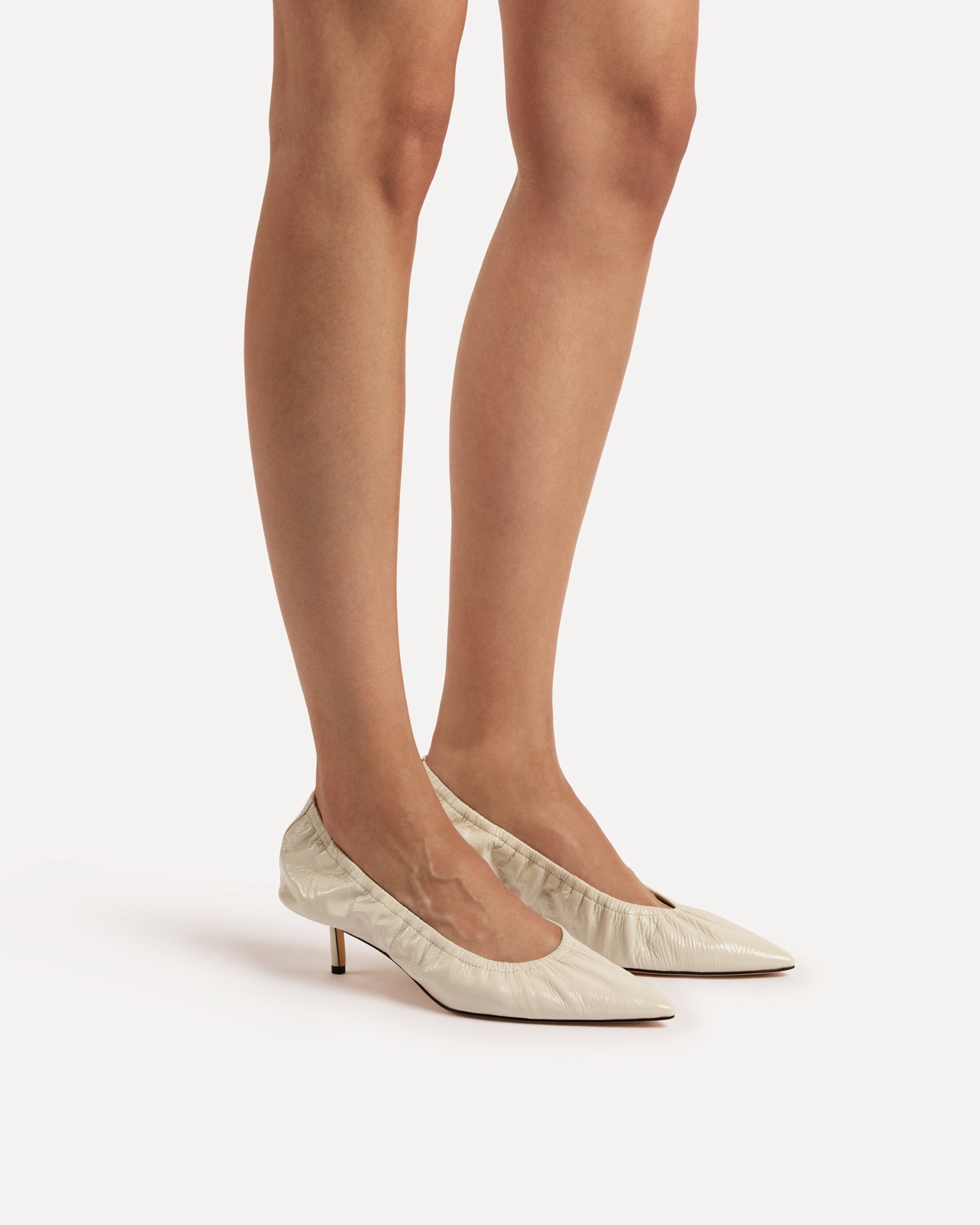 A white leather kitten heel